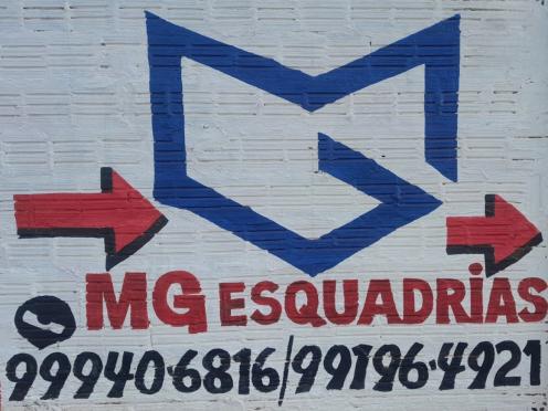 logo da empresa MG Esquadrias de Madeira