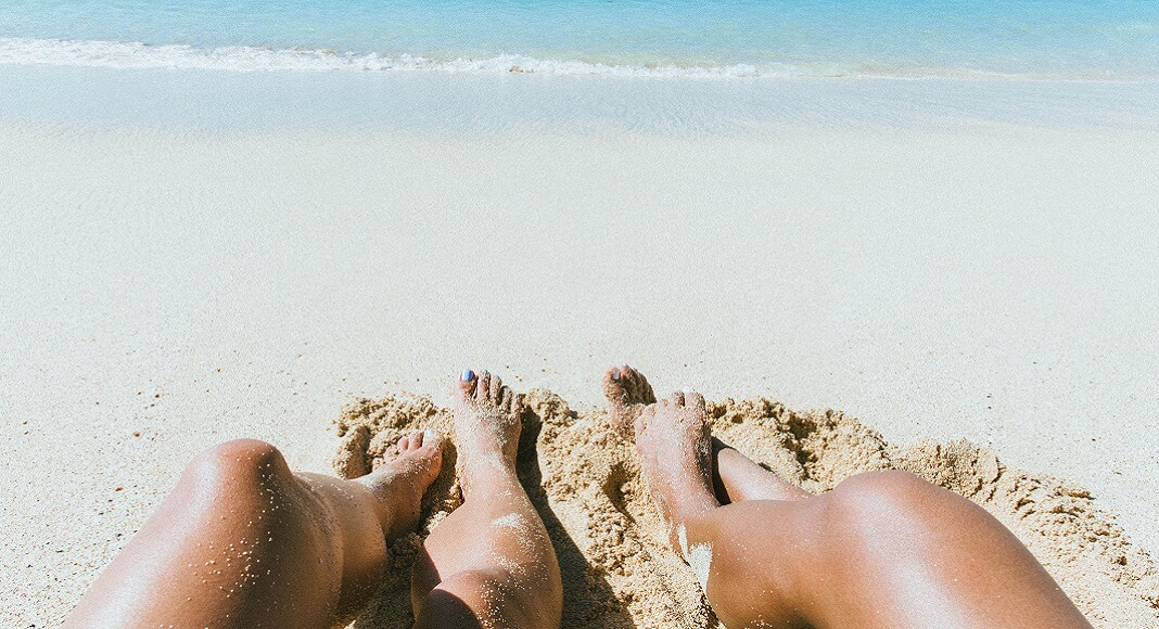 Piernas en playa