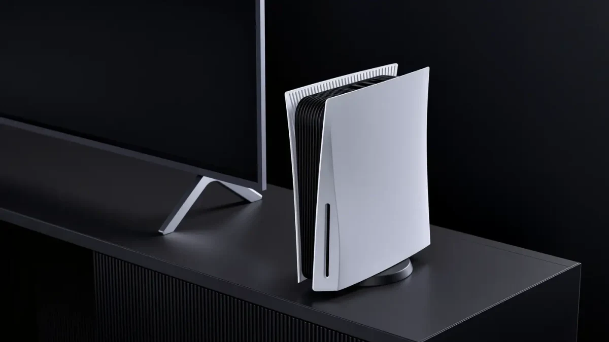 Close-up of a white next-gen console on a media shelf