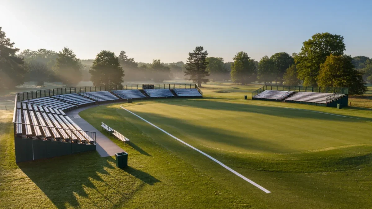 Empty first tee grandstand at sunrise before match day