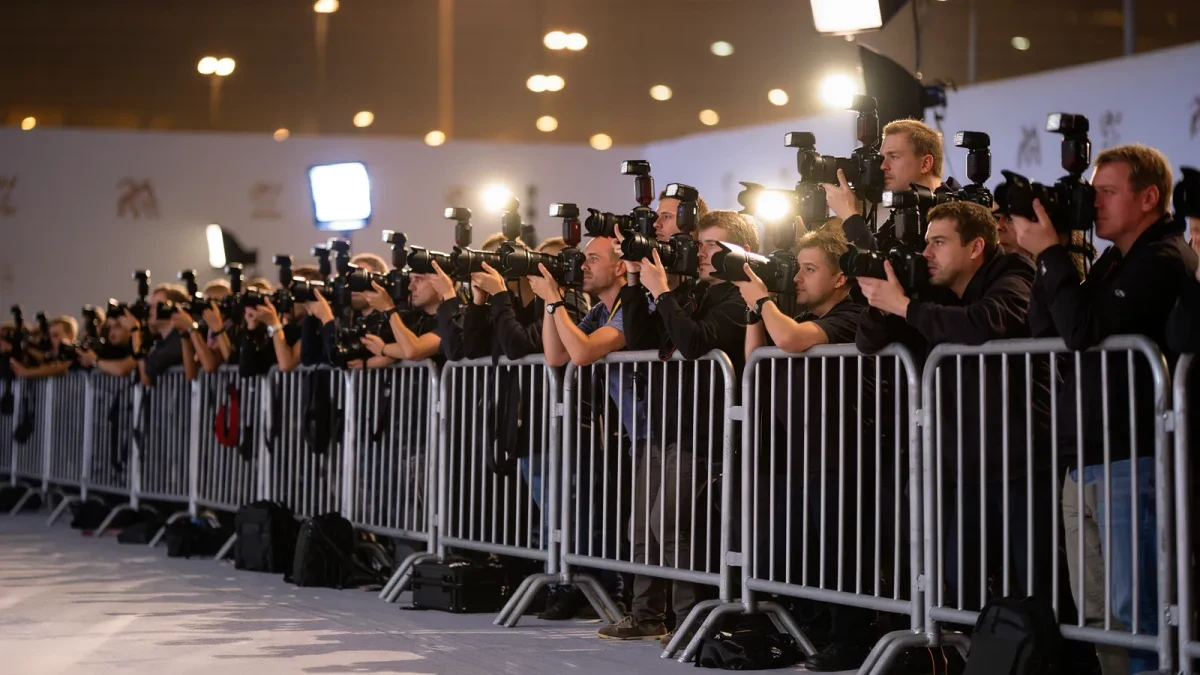 Crowd of photographers shooting a premiere red carpet event