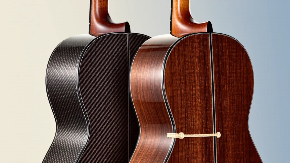 Close-up of woven carbon fiber classical guitar body beside spruce top