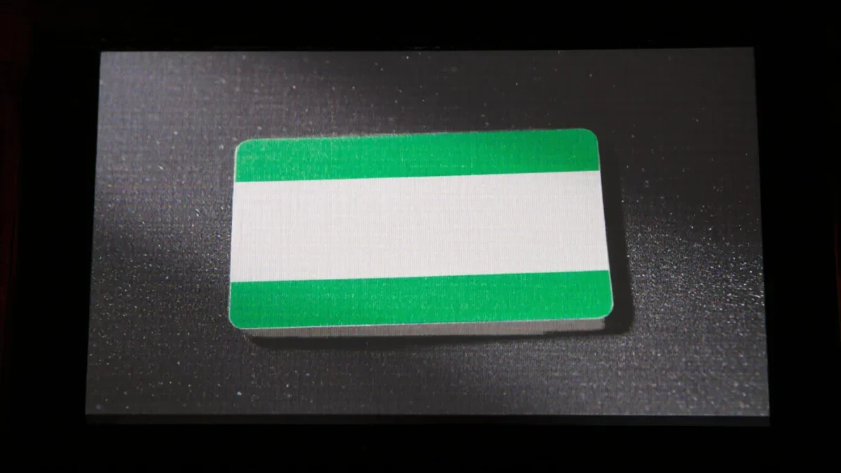 Close-up of a generic rating card placeholder on a cinema screen