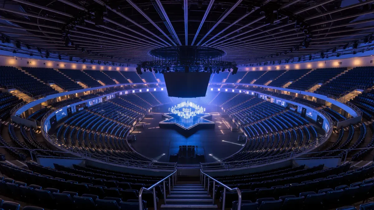 Empty arena stands above a dark season leaderboard wall