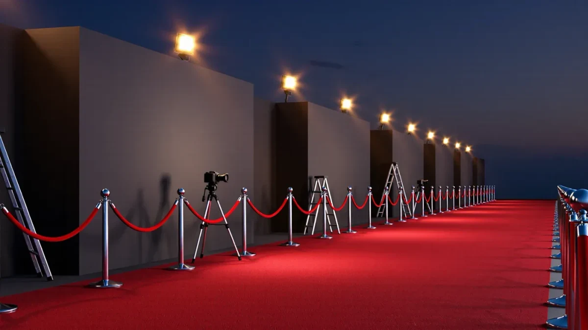 Empty red carpet with stanchions and camera positions before arrivals