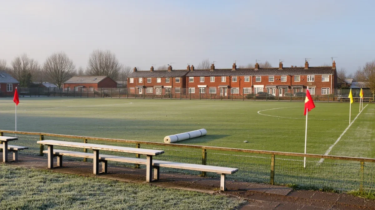 Quiet small-town football ground on a match morning