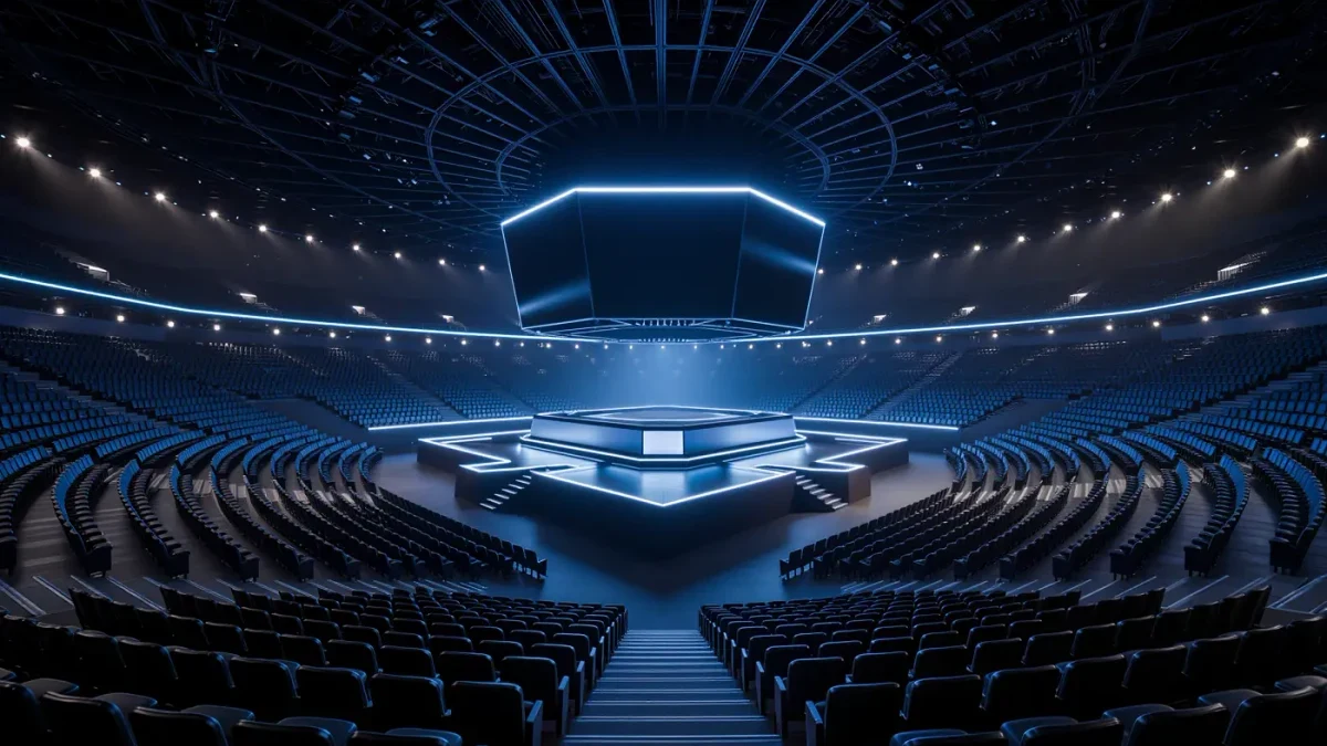Empty esports arena stage with glowing screens and empty seats
