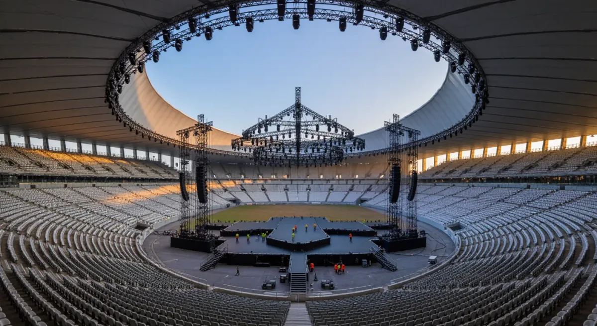 Stadium stage rigging and sound equipment before doors