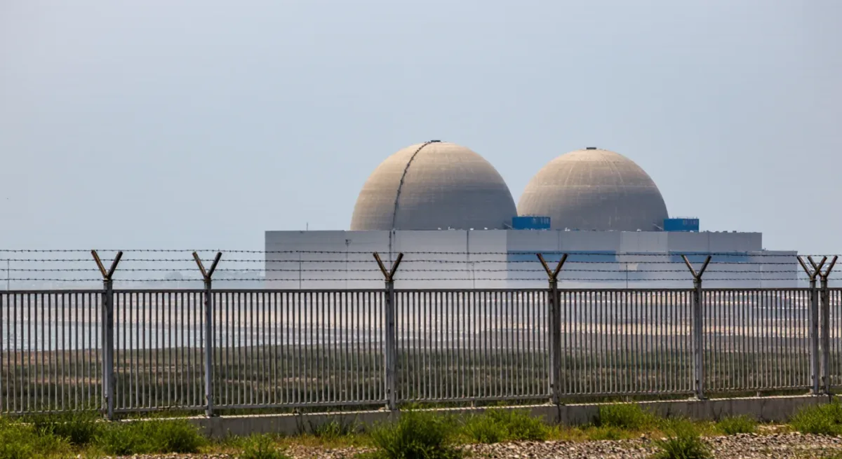 Concrete containment domes of a nuclear power plant by the sea
