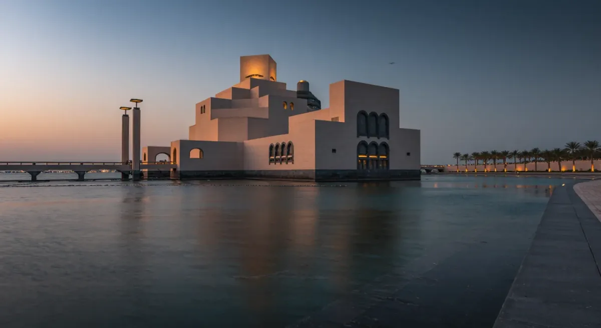 Museum building and waterfront in Doha at dusk