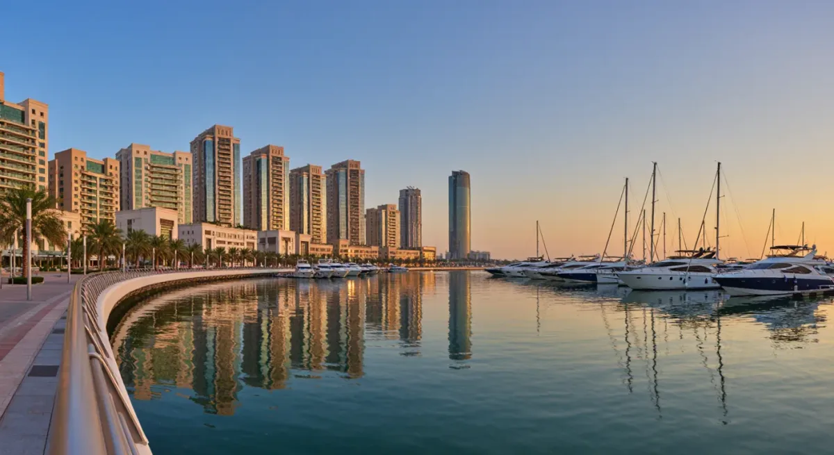 Yas Island residential towers and marina at golden hour