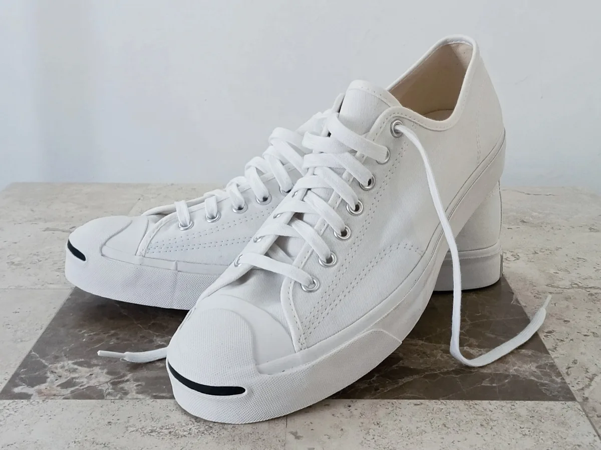 White sneakers at three prices: $40, $90, and $200