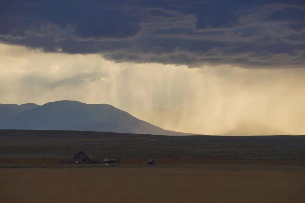 Clouds and rain over a ranchland in Montana