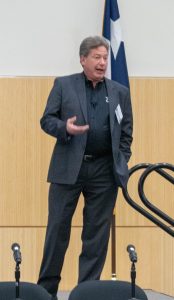 Lone Star College CIO Link Alander speaking on stage during the Tech-in-Ed Summit keynote