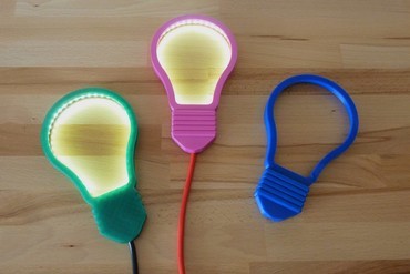 Incandescent light bulb symbol with LEDs
