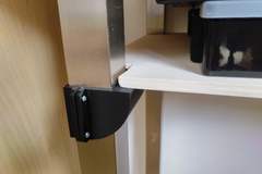 Shelf holder for table foot