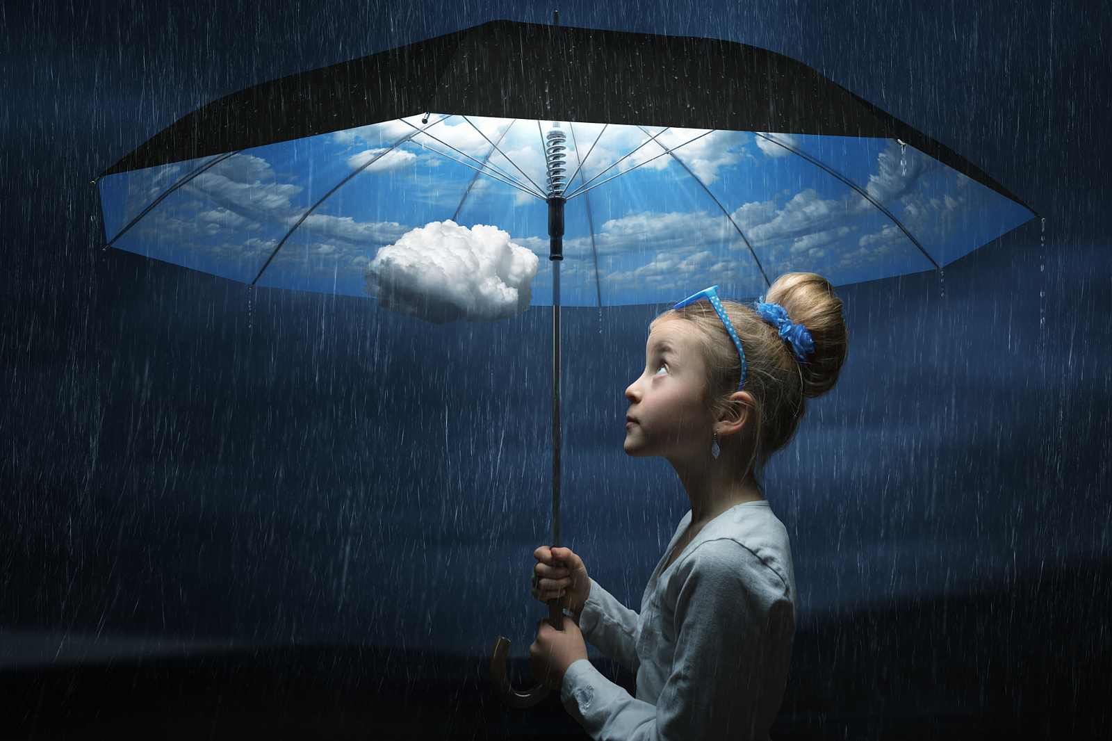 a cute girl enjoy weather with their umbrella