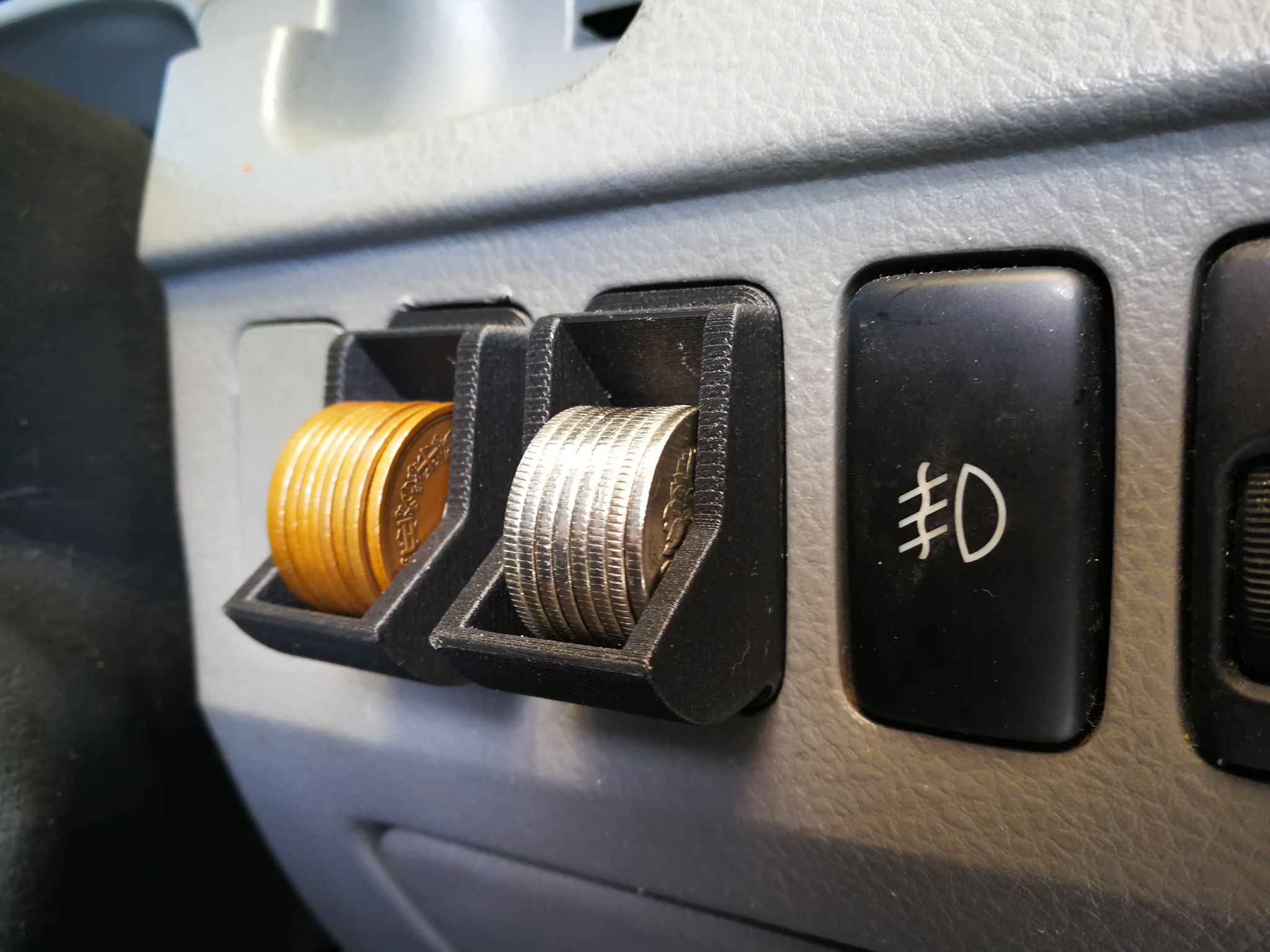 Toyota dashboard coin holder