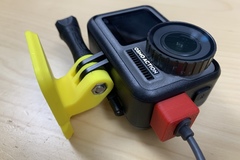Dust cap with USB-C cable slot for DJI Osmo Action