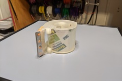 Small Tape dispenser for small rolls of packaging tape
