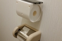 Roll-keeping phone table for toilet walls