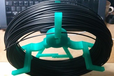 Folded Spool for coiled filament