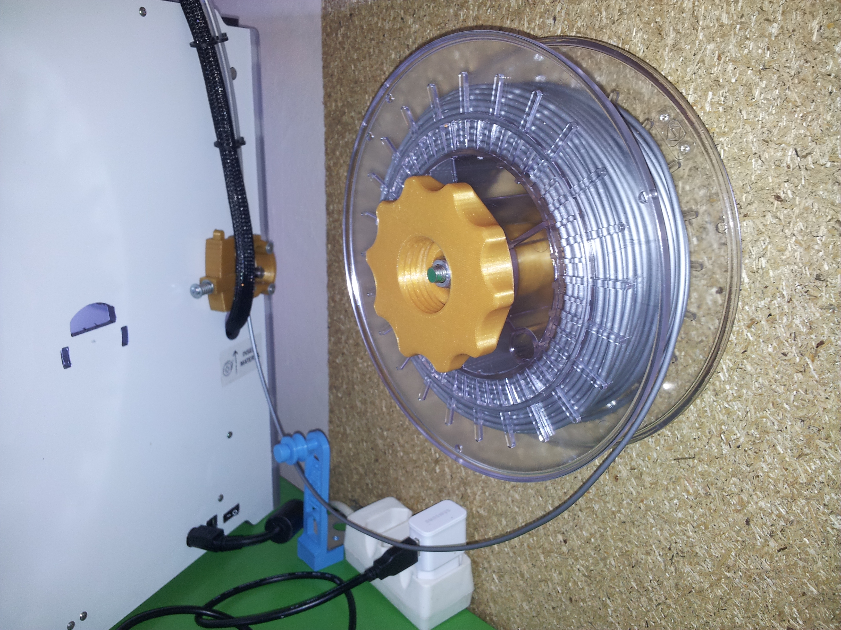 Wall mount for low friction spool holder