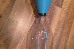 a funnel for a cola bottle