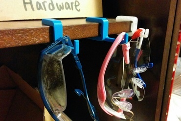 Safety glasses holder - shelf-mount